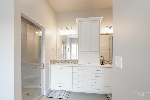 2522 N Foudy Ave, Eagle, ID 83616 - full bath featuring double vanity, a shower stall, tasteful backsplash, and tile patterned floors