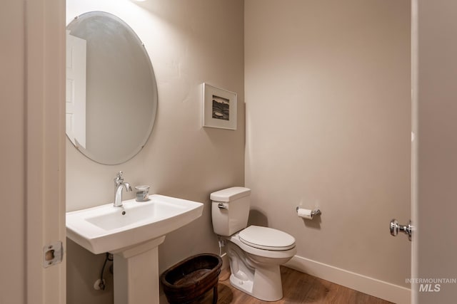 2522 N Foudy Ave, Eagle, ID 83616 - half bath with toilet, wood finished floors, and baseboards