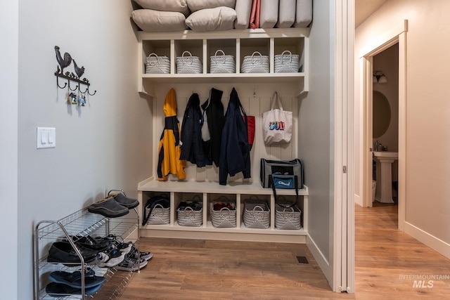 2522 N Foudy Ave, Eagle, ID 83616 - mudroom with wood finished floors, baseboards, and a sink