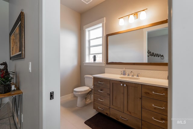 2522 N Foudy Ave, Eagle, ID 83616 - bathroom with vanity, toilet, and baseboards
