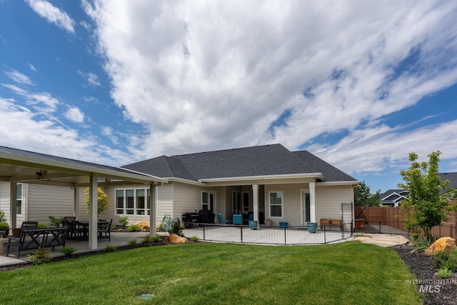 2522 N Foudy Ave, Eagle, ID 83616 - rear view of house with a patio and a shingled roof