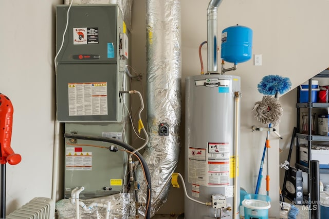 2522 N Foudy Ave, Eagle, ID 83616 - utility room featuring water heater and heating unit