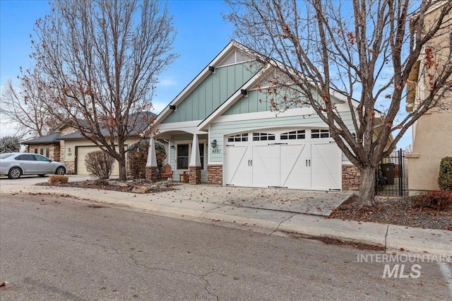 craftsman house with a garage