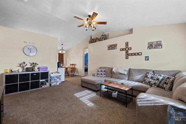 living room featuring ceiling fan, a textured ceiling, carpet flooring, and lofted ceiling