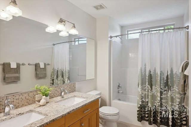 full bathroom featuring a sink, shower / tub combo, decorative backsplash, and visible vents