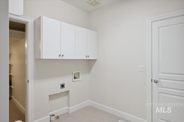 laundry room with cabinet space, hookup for a washing machine, electric dryer hookup, baseboards, and visible vents