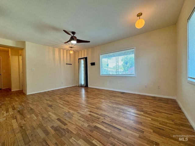 23212NDAVEN 2nd Ave N, Lewiston, ID 83501 - interior space with ceiling fan, baseboards, plenty of natural light, and wood finished floors