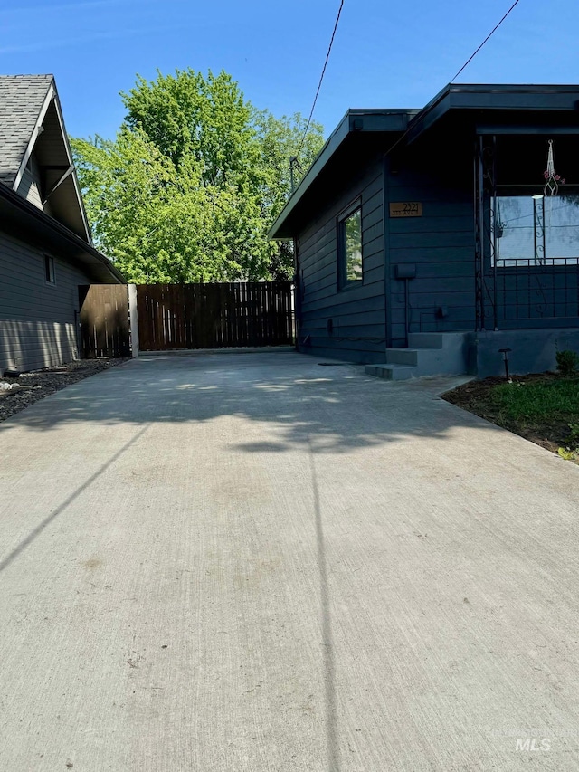23212NDAVEN 2nd Ave N, Lewiston, ID 83501 - view of side of home with fence