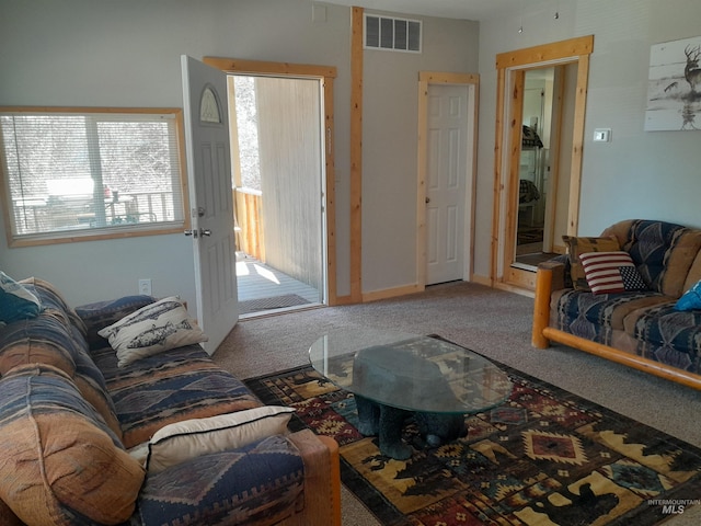 living room with light colored carpet