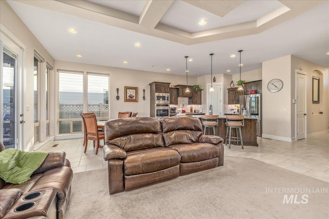 4595 N Tirso Ave, Meridian, ID 83646 - living area featuring recessed lighting, baseboards, light tile patterned flooring, and coffered ceiling