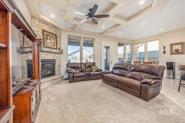 4595 N Tirso Ave, Meridian, ID 83646 - living room with ceiling fan, a stone fireplace, light carpet, coffered ceiling, and recessed lighting