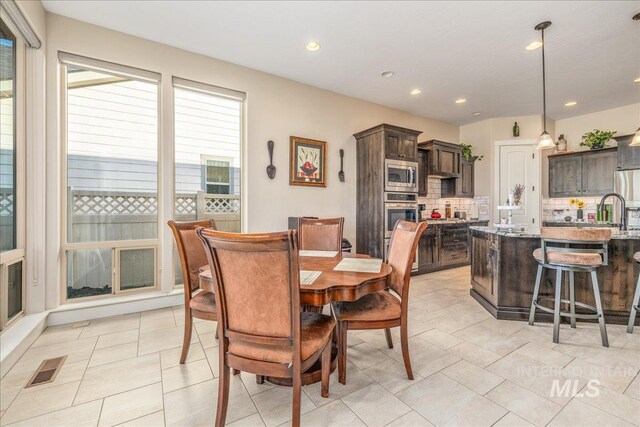 4595 N Tirso Ave, Meridian, ID 83646 - dining space with recessed lighting, visible vents, and light tile patterned flooring