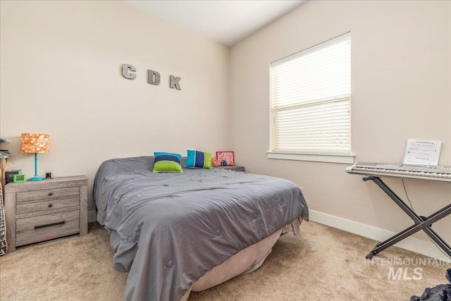 4595 N Tirso Ave, Meridian, ID 83646 - bedroom with baseboards and carpet flooring