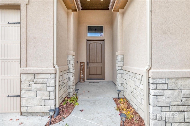 4595 N Tirso Ave, Meridian, ID 83646 - property entrance featuring stucco siding and stone siding