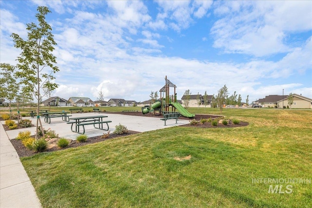 4595 N Tirso Ave, Meridian, ID 83646 - view of community with a yard, playground community, and a residential view