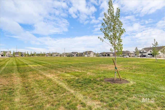 4595 N Tirso Ave, Meridian, ID 83646 - view of yard featuring a residential view