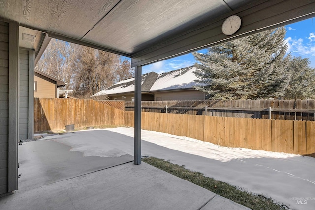 view of snow covered patio