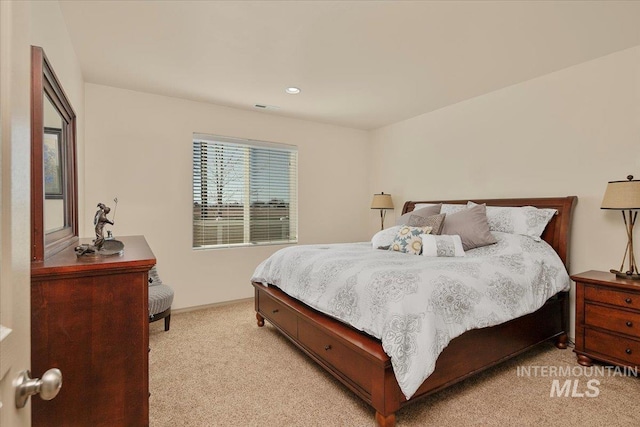 bedroom featuring recessed lighting, baseboards, visible vents, and light carpet