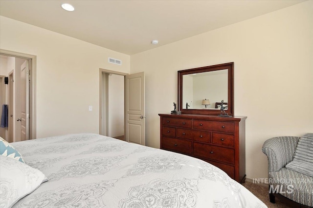 bedroom featuring recessed lighting, carpet, and visible vents