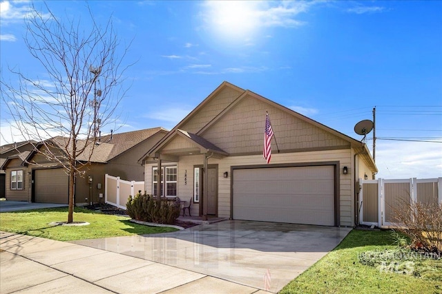 ranch-style home featuring driveway, a front yard, a garage, and fence