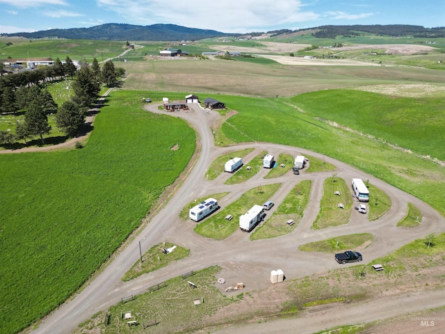 bird's eye view featuring a mountain view and a rural view