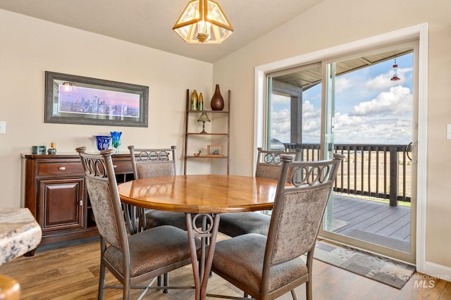 dining space featuring wood finished floors