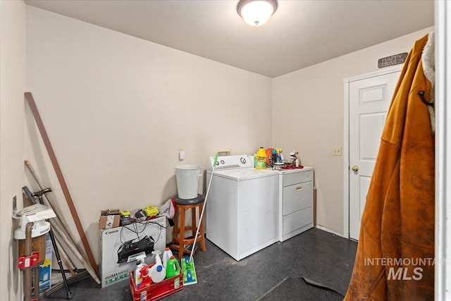 laundry area with laundry area and washer and clothes dryer