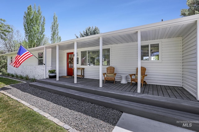 exterior space featuring a wooden deck