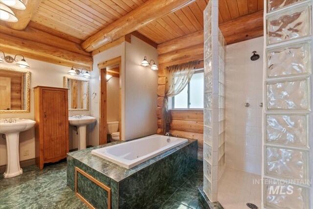 bathroom with wood ceiling, a garden tub, beam ceiling, rustic walls, and tiled shower