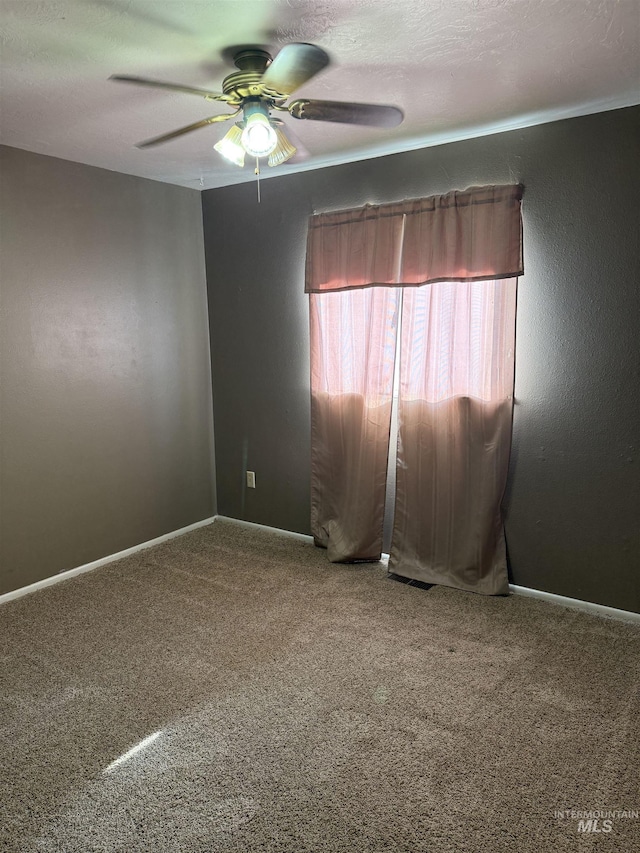 140 Quick Silver Ave, Hagerman, ID 83332 - carpeted empty room with ceiling fan and baseboards
