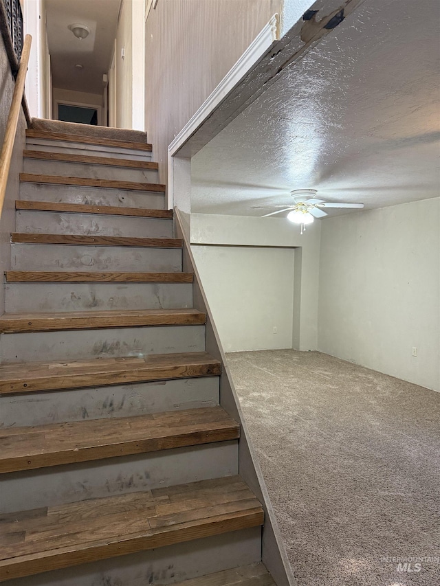 140 Quick Silver Ave, Hagerman, ID 83332 - staircase with a ceiling fan, carpet flooring, and a textured ceiling