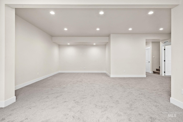 finished basement featuring carpet flooring, recessed lighting, and baseboards