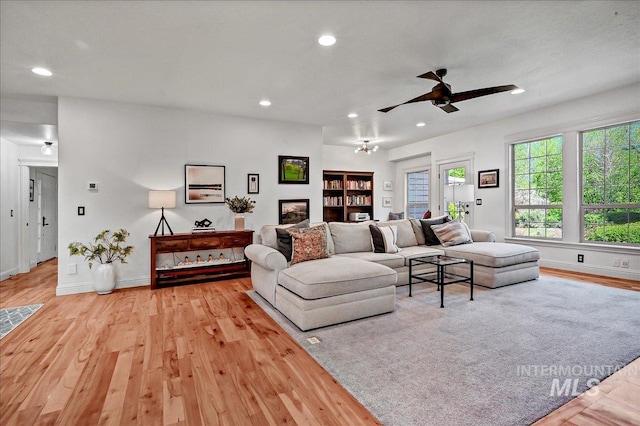 178 Cottonwood Ct, Eagle, ID 83616 - living room with light wood-type flooring, baseboards, ceiling fan, and recessed lighting