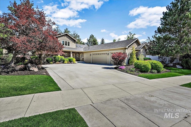 178 Cottonwood Ct, Eagle, ID 83616 - view of front of home with an attached garage, driveway, and fence