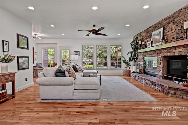 178 Cottonwood Ct, Eagle, ID 83616 - living area featuring a fireplace, a wealth of natural light, baseboards, and recessed lighting