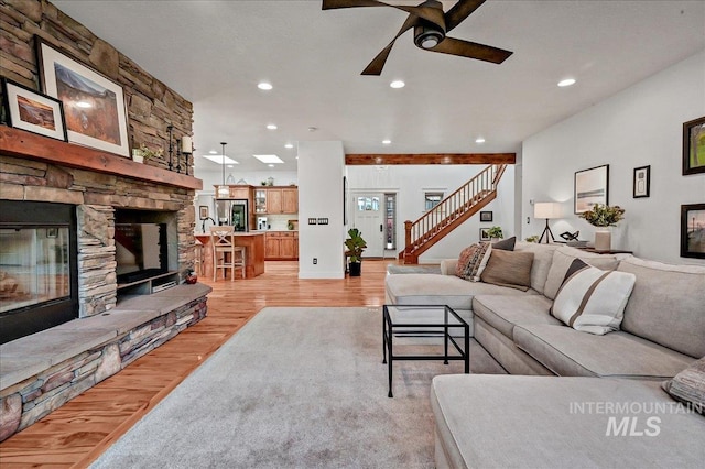 178 Cottonwood Ct, Eagle, ID 83616 - living area with recessed lighting, stairway, a fireplace, a ceiling fan, and light wood-style floors
