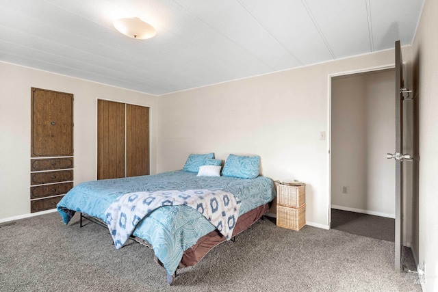 carpeted bedroom with a closet