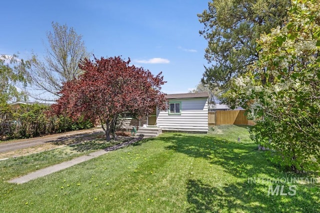 view of yard featuring fence
