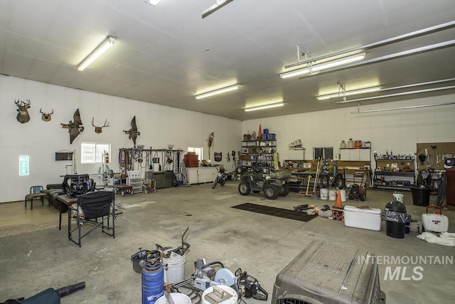 garage with a workshop area