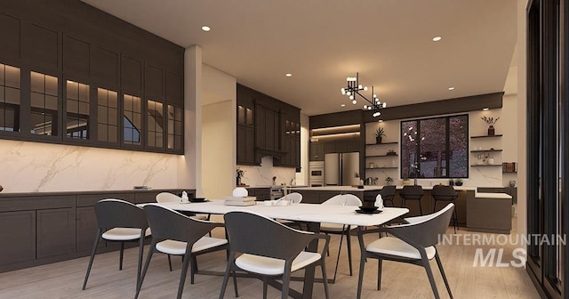 1976 W Oakhampton Dr, Eagle, ID 83616 - dining area featuring light wood finished floors and recessed lighting