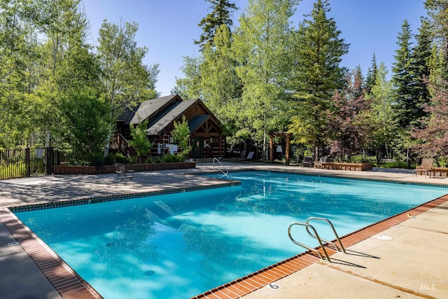 view of pool with a patio