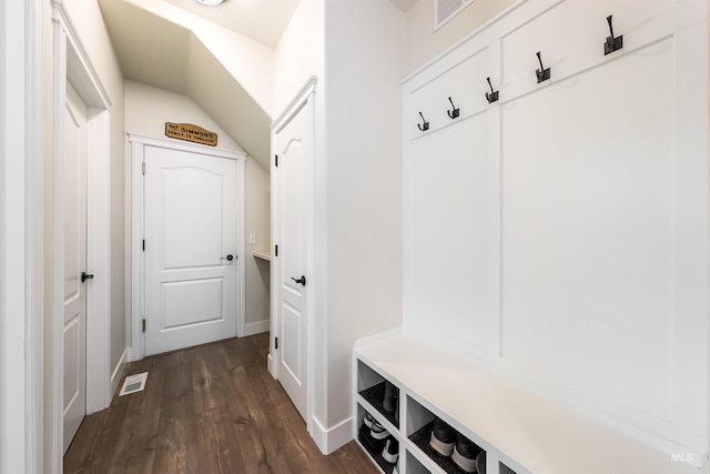 mudroom featuring baseboards, visible vents, and dark wood-type flooring