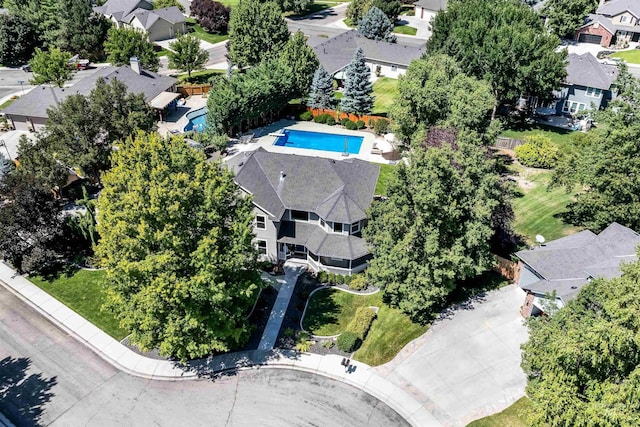 birds eye view of property with a residential view