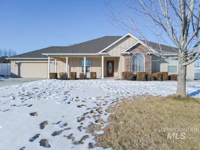 ranch-style house featuring a garage