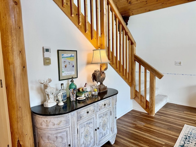 1425 Clements, Mccall, ID 83638 - staircase with wood finished floors, baseboards, and a bar