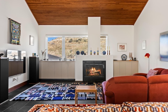 4336 N Star Vista Ln, Eagle, ID 83616 - living area featuring vaulted ceiling, wooden ceiling, a glass covered fireplace, and dark tile patterned flooring
