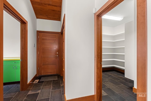 4336 N Star Vista Ln, Eagle, ID 83616 - corridor featuring stone tile flooring and baseboards