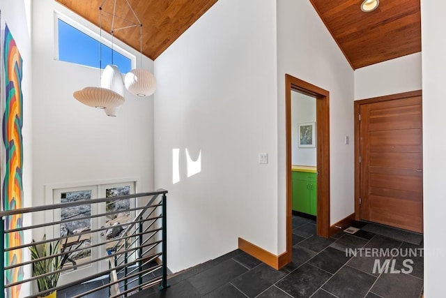 4336 N Star Vista Ln, Eagle, ID 83616 - corridor featuring wooden ceiling, baseboards, and high vaulted ceiling