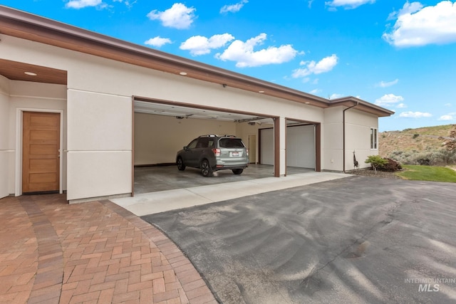4336 N Star Vista Ln, Eagle, ID 83616 - garage featuring asphalt driveway