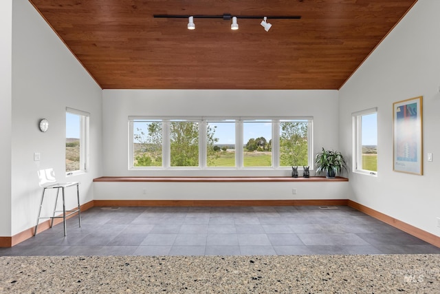 4336 N Star Vista Ln, Eagle, ID 83616 - unfurnished sunroom featuring track lighting, plenty of natural light, and lofted ceiling